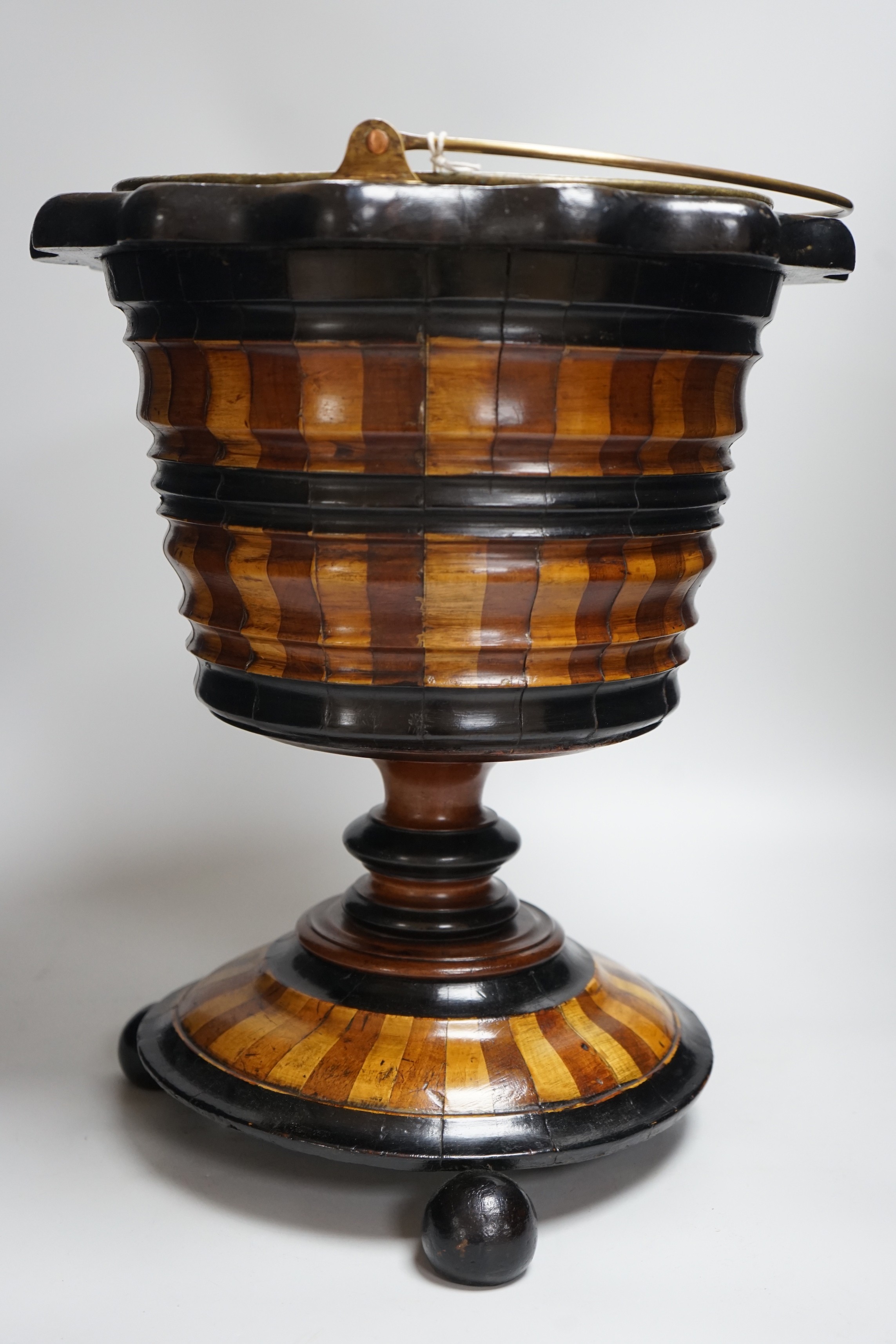 A Dutch ebonised and staved wood bucket, ‘Teestof’ 42cms high